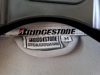 Chaqueta Bridgestone gris
