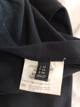 Pantalón negro efecto cremalleras