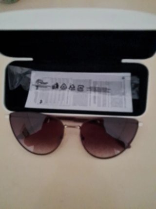 Gafas de sol Calvin Klein morado y plateadas