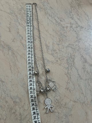 Collana con pendenti a forma di bambini Vestopazzo