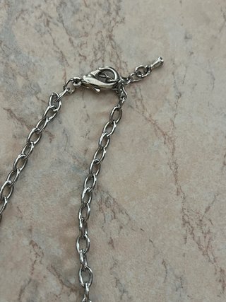 Collana con pendenti a forma di bambini Vestopazzo