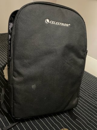 Telescopio Celestron con trípode y accesorios