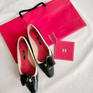 Zapatos planos CH negros y blancos
