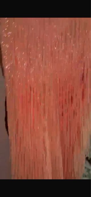 Vestido de fiesta con flecos y canutillo
