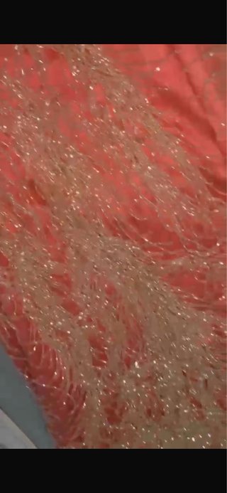 Vestido de fiesta con flecos y canutillo
