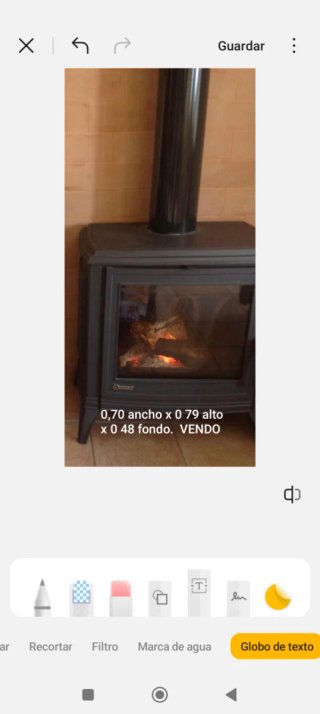 Estufa de hierro con cristal y tubos