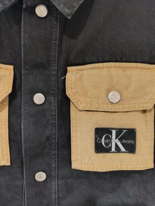 Chaleco vaquero Calvin Klein negro y marrón