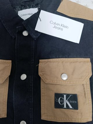 Chaleco vaquero Calvin Klein negro y marrón