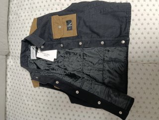 Chaleco vaquero Calvin Klein negro y marrón