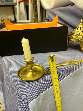 Palmatoria antigua latón con vela