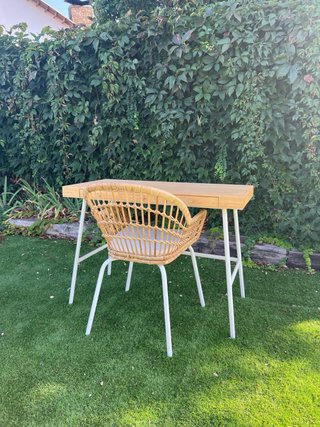Silla de ratán con cojín
