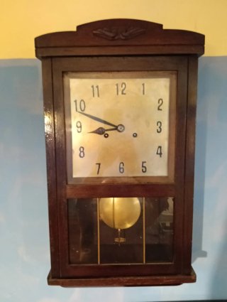 Reloj de pared antiguo madera y metal