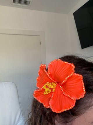 Pinza flor naranja con diamantes