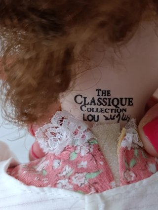 Muñeca de porcelana vintage