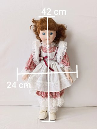 Muñeca de porcelana vintage