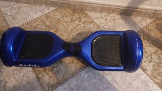 Patín Eléctrico Azul para reparar.
