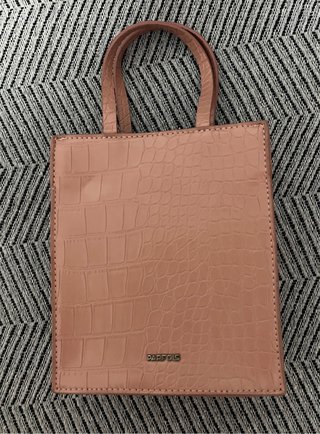 Bolso Parfois rosa efecto piel cocodrilo