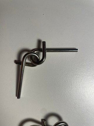 Rompecabezas de ingenio metálico