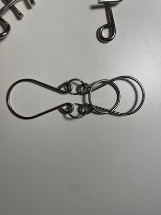 Rompecabezas de ingenio metálico