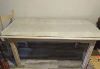 Mesa de comedor de cristal y madera