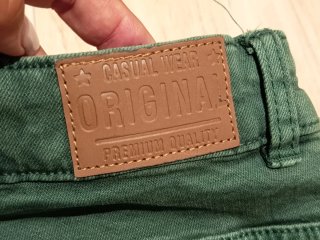 Vaquero elástico verde Corte Inglés T.11-12