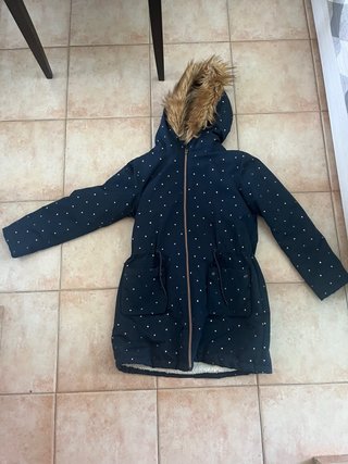 Chaqueta azul con estrellas doradas
