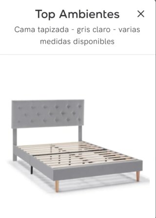 Cama tapizada gris con cabecero capitoné