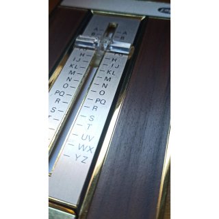 Directorio telefónico Eagle vintage madera y oro