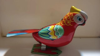 Juguete Antiguo de Chapa a Cuerda - Pájaro / Loro