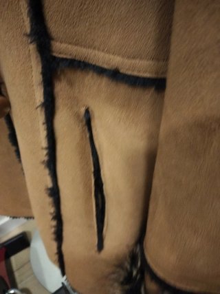 Chaqueta de piel forrada con pelo