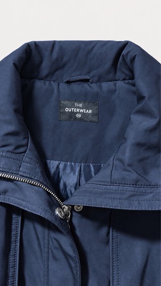 Chaqueta parka azul marino con cintura ajustable