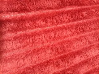 Manta sofá/cama rojo. poliéster