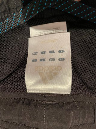 Conjunto deportivo Adidas negro y azul