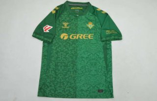 Camiseta Hummel Verde y Dorada