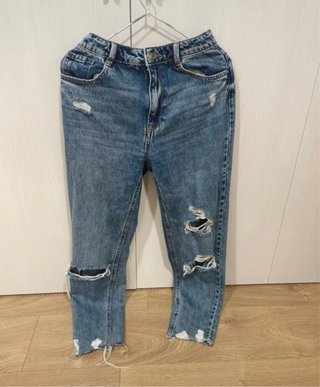 Pantalón ancho vaquero desgastado
