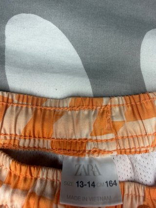 Bañador cuadros naranja y beige