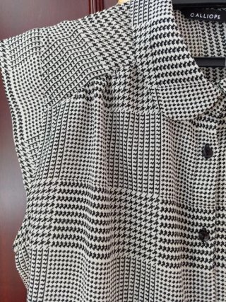 Blusa cuadros blanca y negra