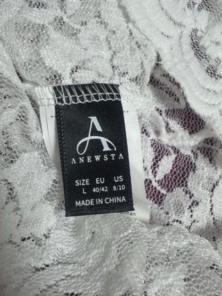 Camiseta blanca de encaje manga larga