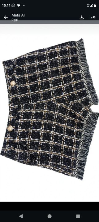 Pantaloncini fantasia a quadri con frange