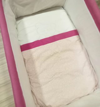 Minicuna bebé rosa y blanca