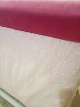 Minicuna bebé rosa y blanca