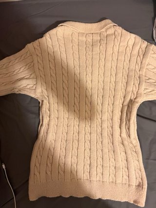 Jersey de lana beige con cremallera
