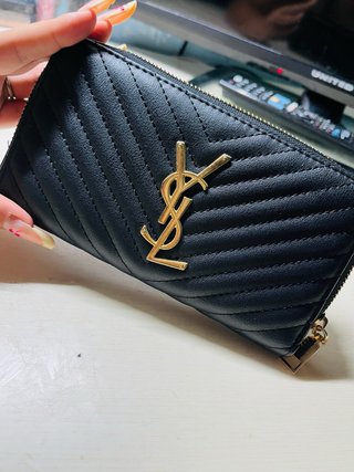 Portafoglio Saint Laurent nero con logo oro