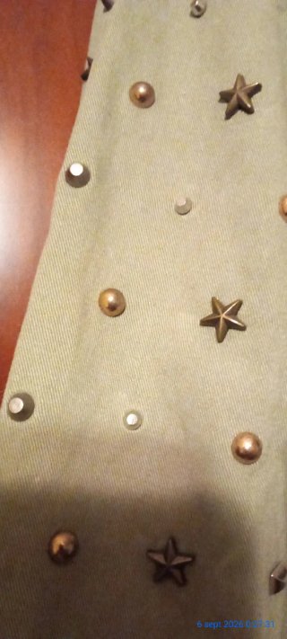 Chaqueta con detalles metalicos