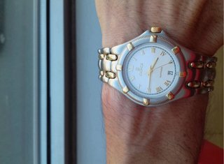 Reloj Kronos Oro y Plata