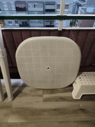 Mesa de jardín redonda de plástico