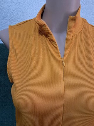 Blusa sin mangas con cremallera