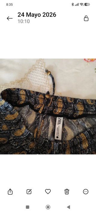 Pantalones estampados paisley negro y dorado