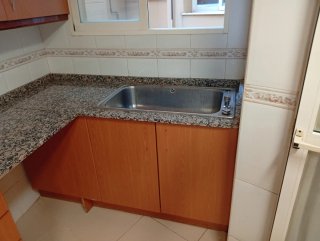 Mueble de cocina madera y piedra
