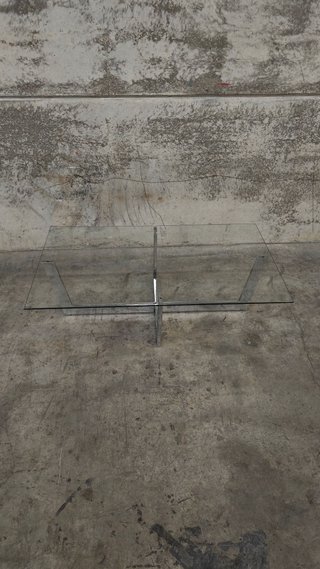 Mesa de centro Plam cristal transparente y estructura de acero acabado cromado 120 x 70 cm